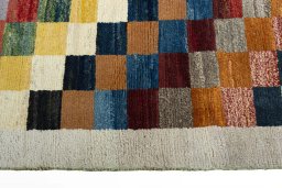 Close-up detail of 2000s Persian Gabbeh rug from Iran / Persia showing Wool weave