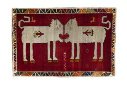 Full view of 2000s Persian Gabbeh rug from Iran / Persia, 147 × 100 cm in Red tones