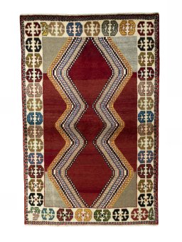 Full view of 2000s Persian Gabbeh rug from Iran / Persia, 168 × 110 cm in Red tones