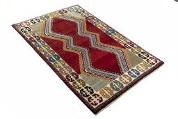 Close-up detail of 2000s Persian Gabbeh rug from Iran / Persia showing Wool weave