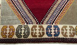 Central medallion detail of 2000s Persian Gabbeh rug from Iran / Persia