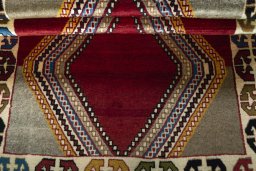 Full view of 2000s Persian Gabbeh rug from Iran / Persia, 168 × 110 cm in Red tones