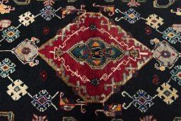Central medallion detail of 2000s Persian Gabbeh rug from Iran / Persia