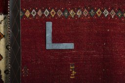 Close-up detail of 2000s Persian Gabbeh rug from Iran / Persia showing Wool weave
