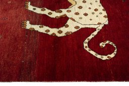 Close-up detail of 2000s Persian Gabbeh rug from Iran / Persia showing Wool weave