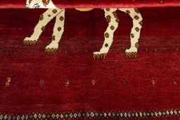 Full view of 2000s Persian Gabbeh rug from Iran / Persia, 193 × 156 cm in Red tones