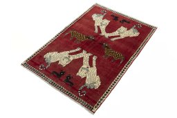 Corner detail of 2000s Persian Gabbeh rug showing border pattern and Wool pile
