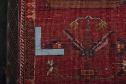 Close-up detail of 2000s Persian Gabbeh rug from Iran / Persia showing Wool weave