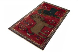 Corner detail of 2000s Persian Gabbeh rug showing border pattern and Wool pile