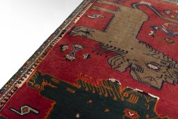 Backside of handmade 2000s Persian Gabbeh rug showing knot structure and weave density