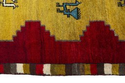 Close-up detail of 2000s Persian Gabbeh rug from Iran / Persia showing Wool weave