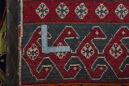 Close-up detail of 2000s Persian Gabbeh rug from Iran / Persia showing Wool weave