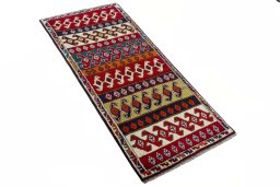 Close-up detail of 2000s Persian Gabbeh rug from Iran / Persia showing Wool weave