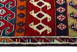 Close-up detail of 2000s Persian Gabbeh rug from Iran / Persia showing Wool weave