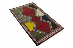Close-up detail of 2000s Persian Gabbeh rug from Iran / Persia showing Wool weave