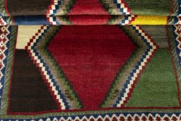 Full view of 2000s Persian Gabbeh rug from Iran / Persia, 170 × 110 cm in Multi Color tones