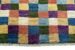 Central medallion detail of 2000s Persian Gabbeh rug from Iran / Persia