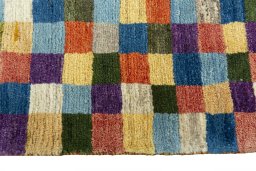 Close-up detail of 2000s Persian Gabbeh rug from Iran / Persia showing Wool weave