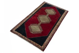 Corner detail of 2000s Persian Gabbeh rug showing border pattern and Wool pile