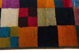 Full view of 2000s Persian Gabbeh rug from Iran / Persia, 108 × 64 cm in Multi Color tones