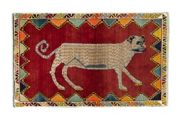 Full view of 2000s Persian Gabbeh rug from Iran / Persia, 184 × 114 cm in Red tones