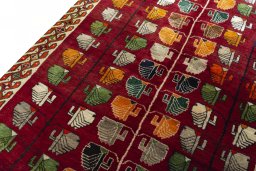 Backside of handmade 2000s Persian Gabbeh rug showing knot structure and weave density