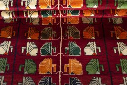 Full view of 2000s Persian Gabbeh rug from Iran / Persia, 227 × 155 cm in Red tones