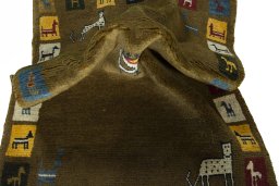 Corner detail of New Persian Gabbeh rug showing border pattern and Wool pile