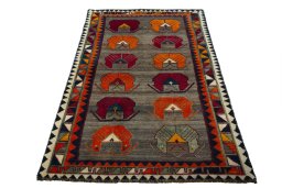 Surface texture of 2000s Persian Gabbeh rug with natural Wool and intricate pattern