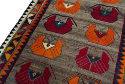 Backside of handmade 2000s Persian Gabbeh rug showing knot structure and weave density