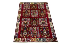 Surface texture of 2000s Persian Gabbeh rug with natural Wool and intricate pattern