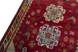 Backside of handmade 2000s Persian Gabbeh rug showing knot structure and weave density