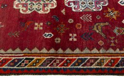 Full view of 2000s Persian Gabbeh rug from Iran / Persia, 175 × 105 cm in Red tones