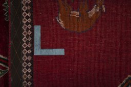 Close-up detail of 2000s Persian Gabbeh rug from Iran / Persia showing Wool weave