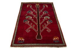 Surface texture of 2000s Persian Gabbeh rug with natural Wool and intricate pattern