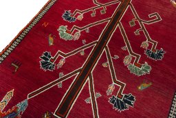 Backside of handmade 2000s Persian Gabbeh rug showing knot structure and weave density