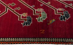 Close-up detail of 2000s Persian Gabbeh rug from Iran / Persia showing Wool weave