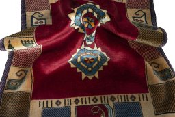 Corner detail of 2000s Persian Gabbeh rug showing border pattern and Wool pile
