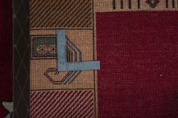Close-up detail of 2000s Persian Gabbeh rug from Iran / Persia showing Wool weave