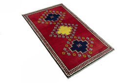 Close-up detail of 2000s Persian Gabbeh rug from Iran / Persia showing Wool weave