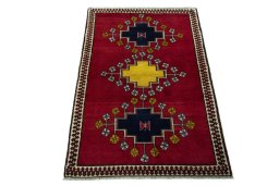 Surface texture of 2000s Persian Gabbeh rug with natural Wool and intricate pattern