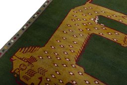 Backside of handmade 2000s Persian Gabbeh rug showing knot structure and weave density