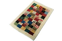 Corner detail of New Persian Gabbeh rug showing border pattern and Wool pile