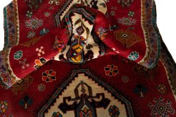 Corner detail of 2000s Persian Gabbeh rug showing border pattern and Wool pile
