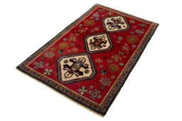 Corner detail of 2000s Persian Gabbeh rug showing border pattern and Wool pile
