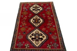 Surface texture of 2000s Persian Gabbeh rug with natural Wool and intricate pattern