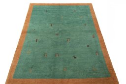 Surface texture of New Persian Gabbeh rug with natural Wool and intricate pattern