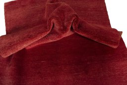 Corner detail of New Persian Gabbeh rug showing border pattern and Wool pile