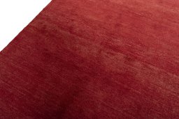 Backside of handmade New Persian Gabbeh rug showing knot structure and weave density