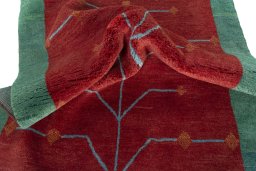Corner detail of New Persian Gabbeh rug showing border pattern and Wool pile